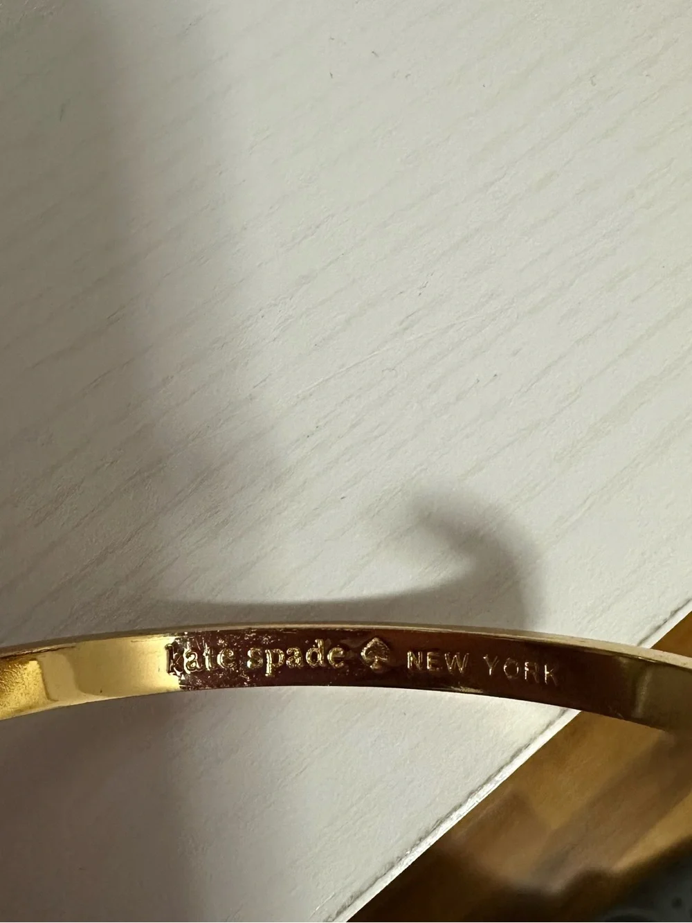 kate spade Gold and Ivory Crystal-Accent Bangle Bracelet - Picture 2 of 4